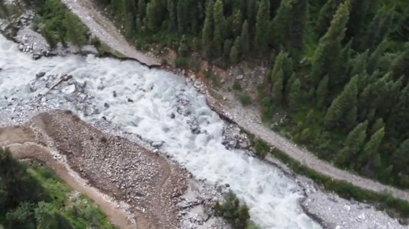 Road destroyed by landslide and flooding of Karakol river under restoration in Ayu-Tor gorge