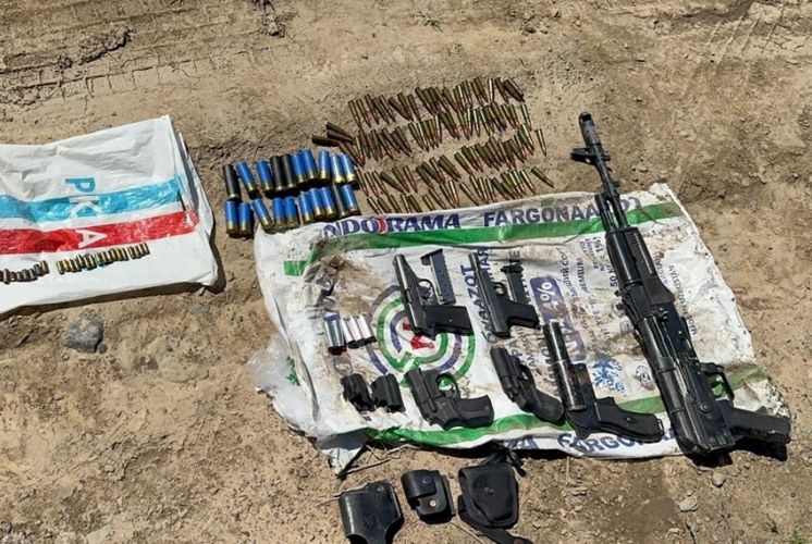 Weapons cache containing assault rifle and pistols found in Kara-Balta