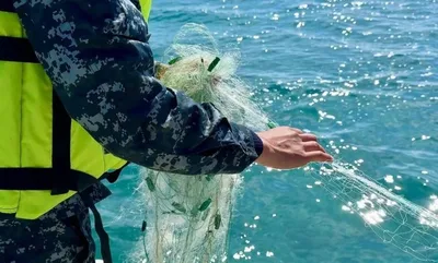 На Иссык-Куле со дна озера подняли более 7 километров браконьерских сетей