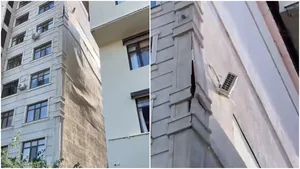 В Бишкеке у многоэтажного дома разрушается фасад прямо на глазах (видео)